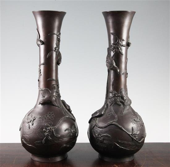A pair of Japanese bronze bottle vases, 19th century, 30cm